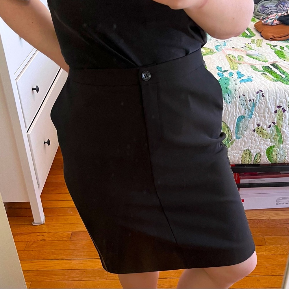 MIDI black skirt with golden details